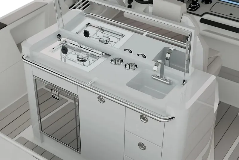 Slide: The Image of Modern kitchen area on 2026 Wellcraft 28 T-Top boat with stove and sink. - 5