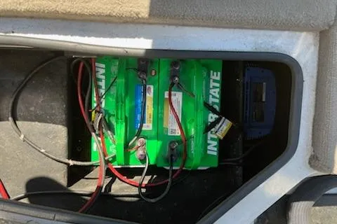 Slide: The Image of Battery compartment of a 2004 Ranger 210 Reata boat with Interstate batteries. - 10