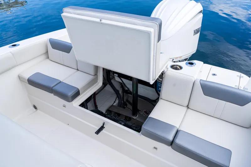 Slide: The Image of 2027 Sailfish 232 CC boat interior with seating and engine compartment. - 16