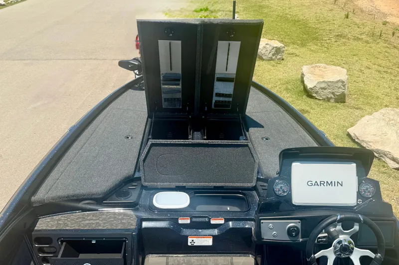 Slide: The Image of 2026 Nitro Z21 XL Pro boat interior with Garmin navigation system and storage compartments. - 12