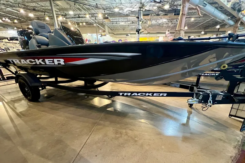 The Image of 2026 Tracker Pro Team 175 boat on display in a showroom. - 0