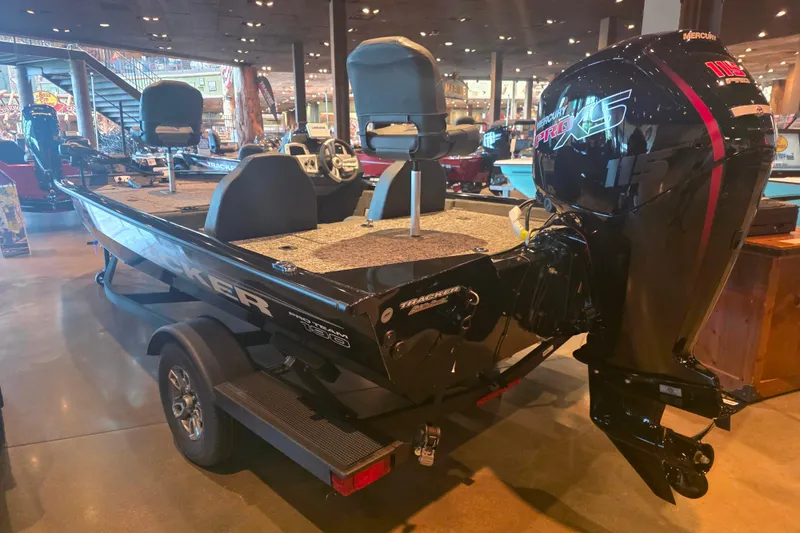 Slide: The Image of 2026 Tracker Pro Team 190 boat with Mercury Pro XS engine in showroom. - 3