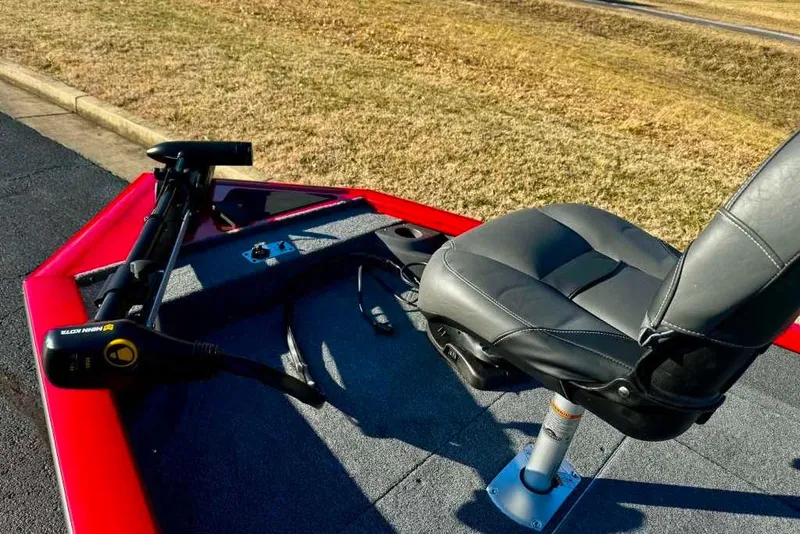 Slide: The Image of 2026 Tracker Pro Team 175 Crappie Edition boat with seat and trolling motor. - 2