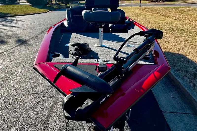 Slide: The Image of 2026 Tracker Pro Team 175 Crappie Edition boat with trolling motor on a sunny day. - 4