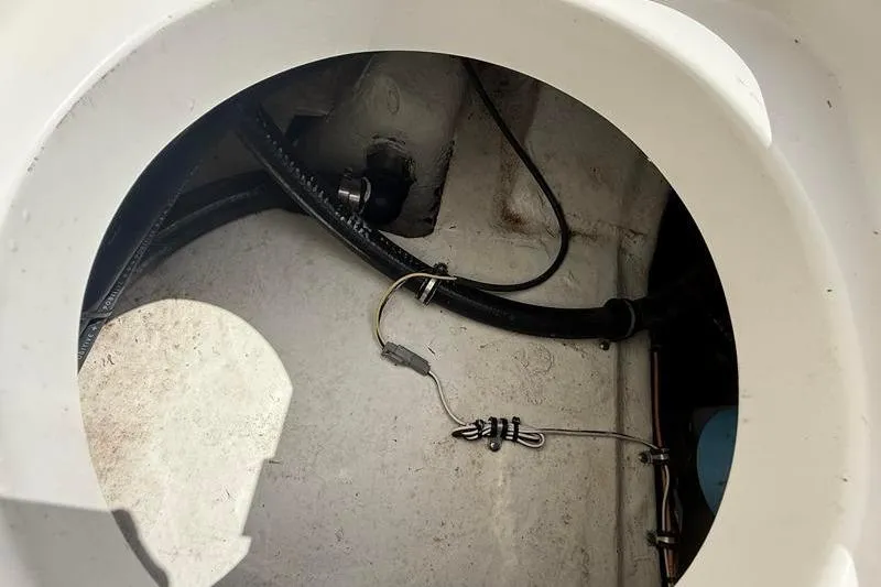 Slide: The Image of 2018 Sea Hunt BX 25 FS boat interior wiring and tubing detail. - 15
