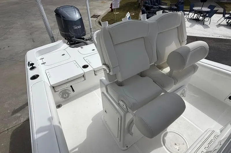 Slide: The Image of 2018 Sea Hunt BX 25 FS boat interior with seating and outboard motor. - 20