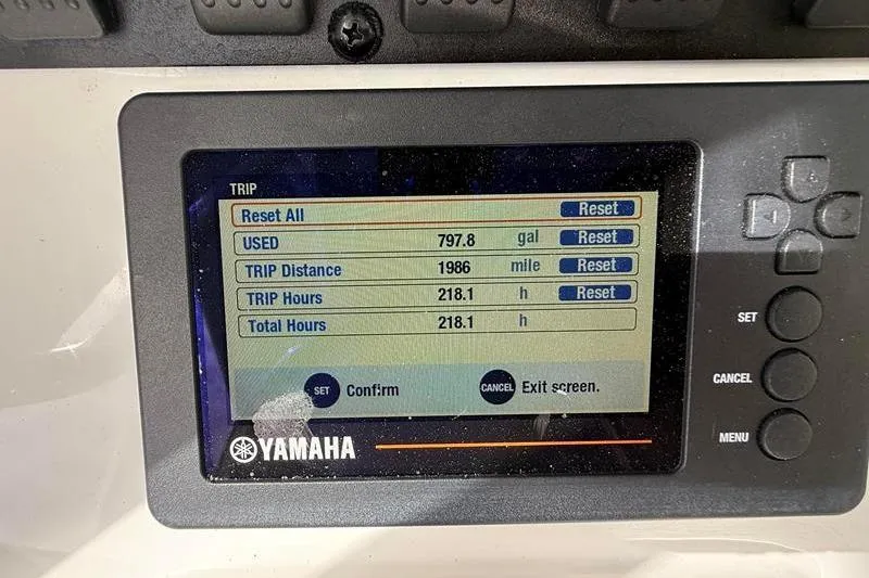 Slide: The Image of Yamaha display showing trip data: 797.8 gallons used, 1986 miles, 218.1 hours on Sea Hunt BX 25 FS. - 22