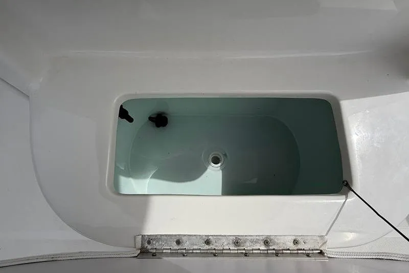 Slide: The Image of Livewell compartment on a 2018 Sea Hunt BX 25 FS boat. - 37
