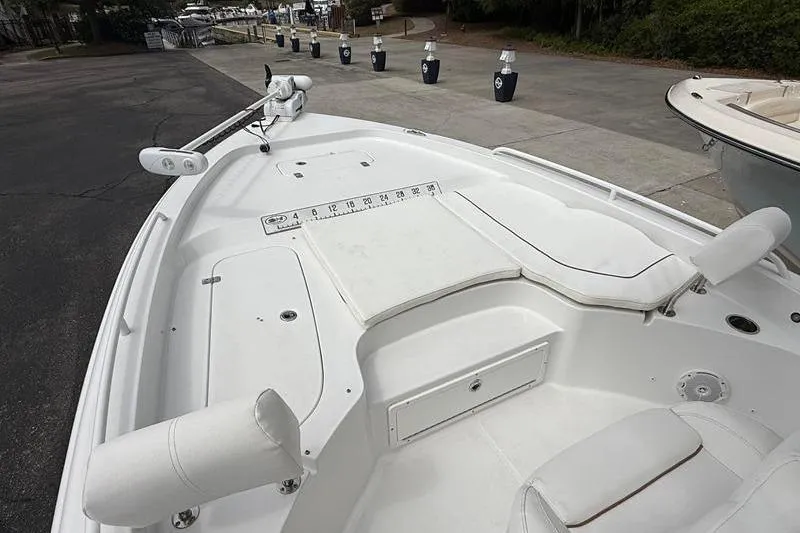Slide: The Image of 2018 Sea Hunt BX 25 FS boat deck with seating and storage compartments. - 39