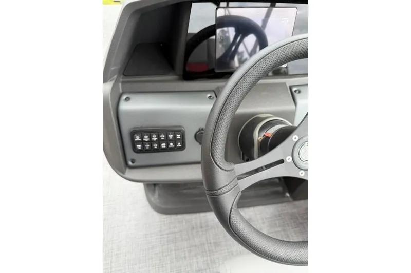 Slide: The Image of Steering console of 2026 Sun Tracker Party Barge 22 RF DLX pontoon boat. - 6