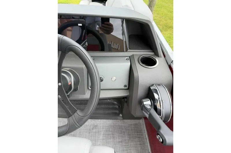 Slide: The Image of Steering console of 2026 Sun Tracker Party Barge 22 RF DLX pontoon boat. - 7