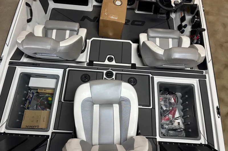 Slide: The Image of 2026 Nitro Z20 XL Pro boat interior with storage compartments and seating. - 7