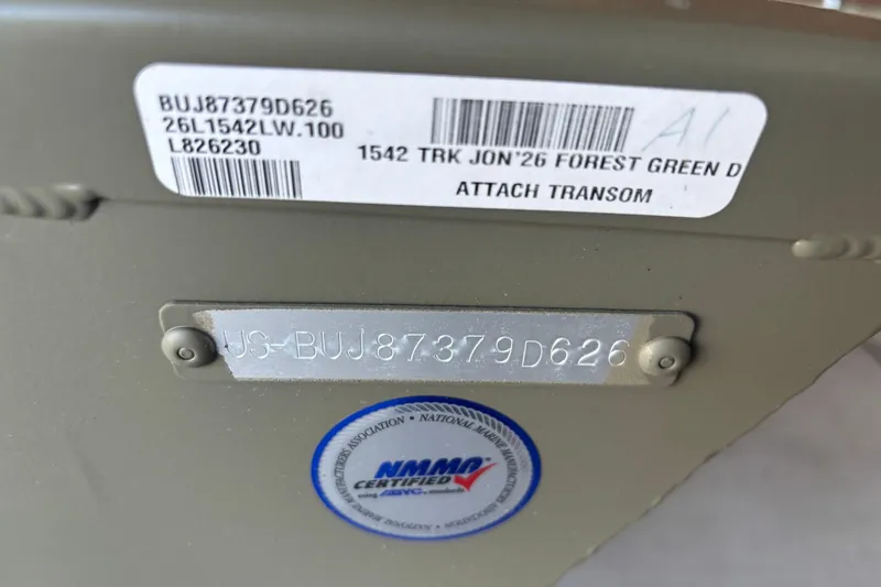 Slide: The Image of 2026 Tracker Grizzly 15 Jon boat identification plate with serial number and NMMA certification. - 4