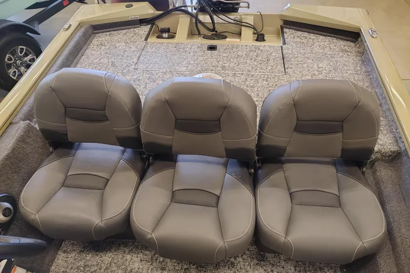 Slide: The Image of 2026 Tracker Pro Team 175 Crappie Edition boat seats, featuring gray upholstery and spacious design. - 3