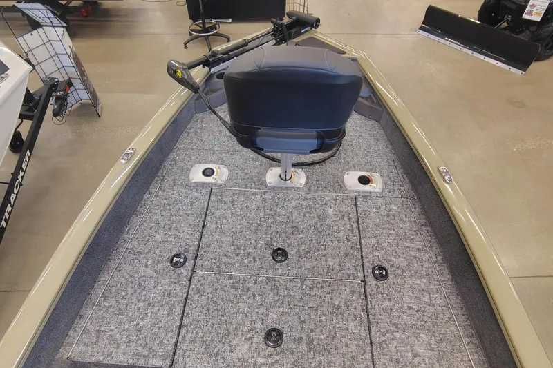 Slide: The Image of 2026 Tracker Pro Team 175 Crappie Edition boat interior with seating and storage compartments. - 7