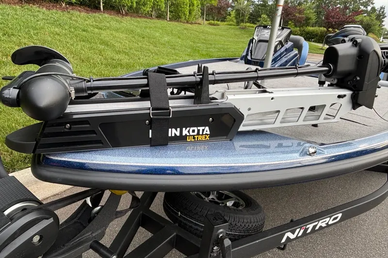Slide: The Image of 2026 Nitro Z20 XL boat with Minn Kota Ultrex trolling motor on trailer. - 3