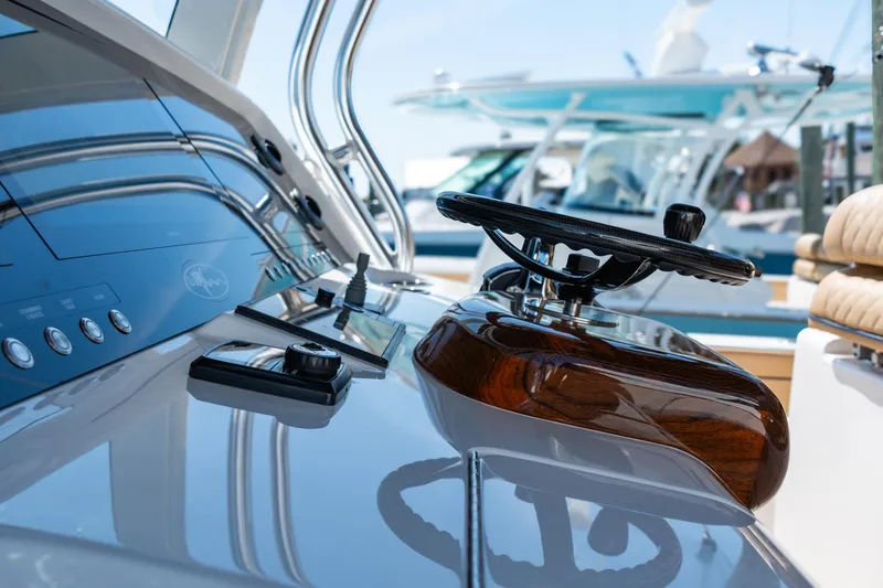 Slide: The Image of 2023 Valhalla Boatworks V-46 helm with modern controls and sleek design. - 19