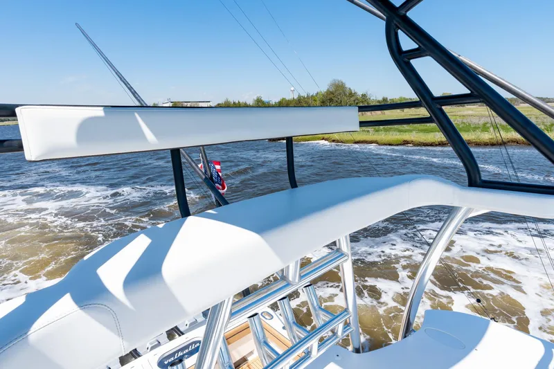 Slide: The Image of 2023 Valhalla Boatworks V-46 cruising on a sunny day, showcasing sleek design and craftsmanship. - 25