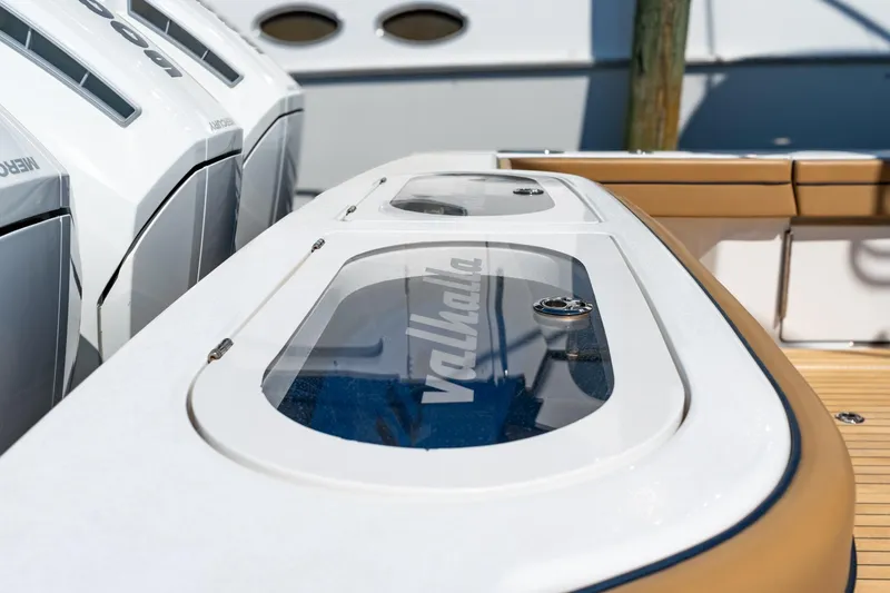 Slide: The Image of 2023 Valhalla Boatworks V-46 with sleek design and powerful engines. - 36