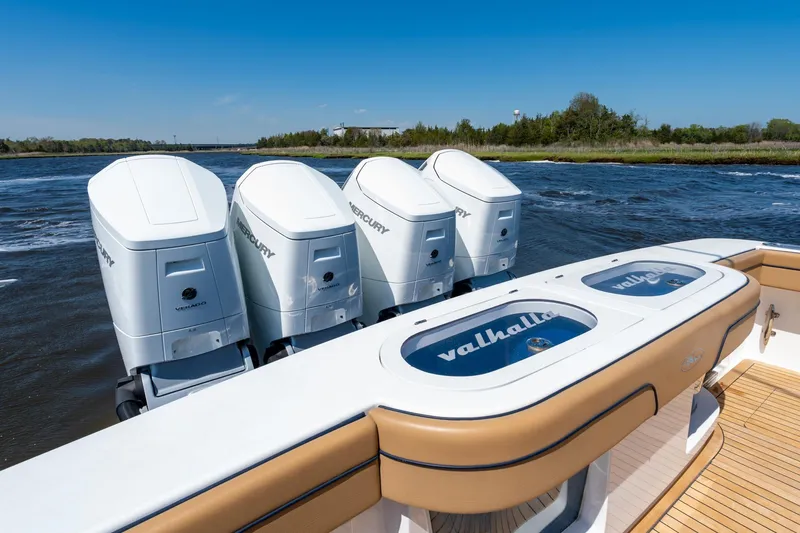 Slide: The Image of 2023 Valhalla V-46 boat with four Mercury engines on a sunny day. - 37