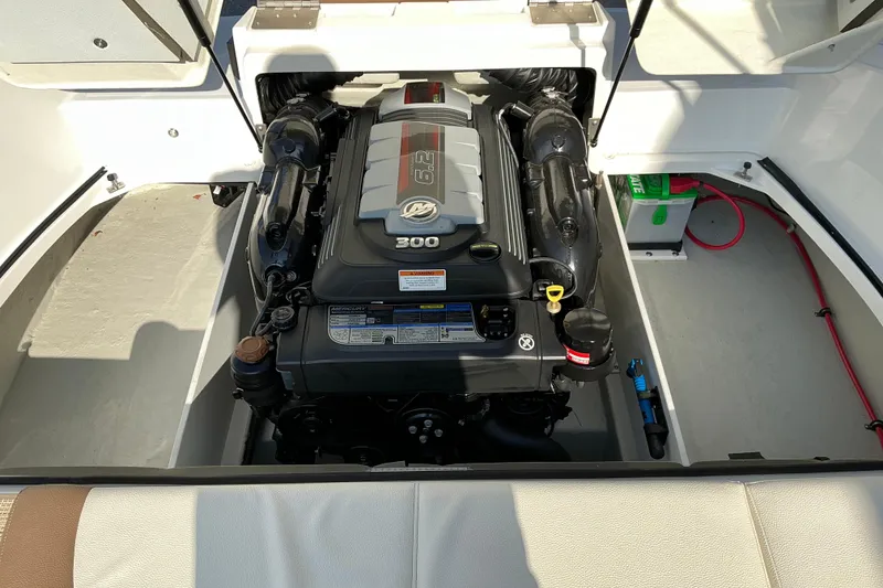 Slide: The Image of 2019 Cobalt CS23 boat engine compartment with a 6.2L Mercury engine. - 11