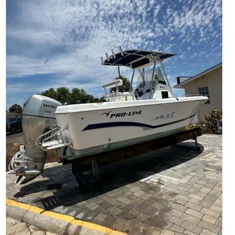 The Image of 2008 Pro-Line 20 Sport boat on a paved yard. - 0