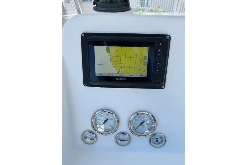 Slide: The Image of Dashboard of 2008 Pro-Line 20 Sport boat with Garmin GPS and gauges. - 8