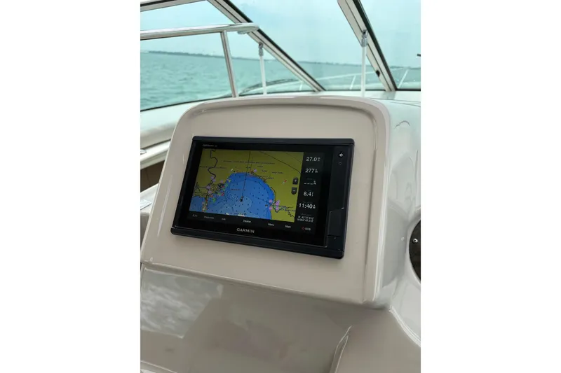 Slide: The Image of Garmin navigation system on 2003 Cruisers Yachts 3470 Express, displaying nautical map. - 14