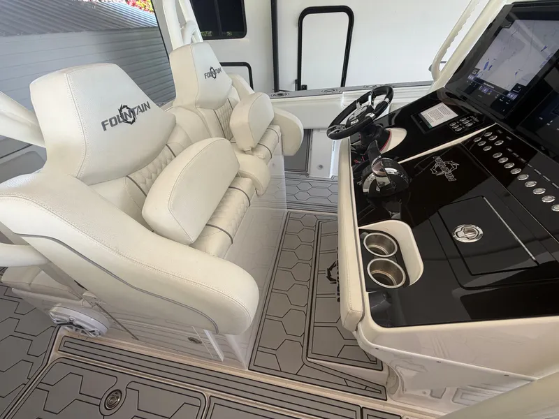Slide: The Image of Interior view of a 2007 Fountain 38 Center Console boat. - 8