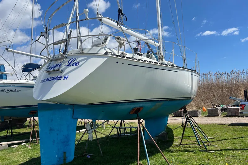 Slide: The Image of Sailboat "Maggie Lee" on stands, C&C Mark III, 1987, East Patchogue, NY. - 19