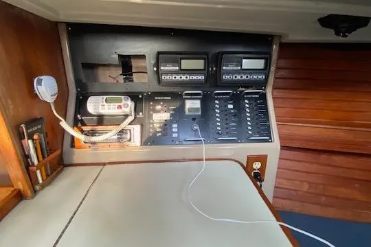 Slide: The Image of 1987 C&C Mark III yacht control panel with navigation and communication equipment. - 4