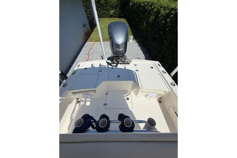 Slide: The Image of 2018 Pathfinder 2500 Hybrid boat with Yamaha 300 engine, docked outdoors. - 17