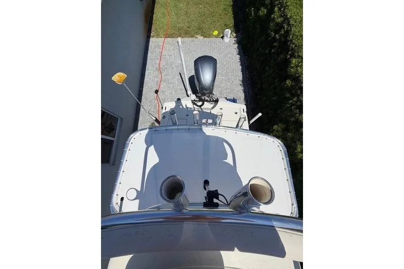 Slide: The Image of Overhead view of a 2018 Pathfinder 2500 Hybrid boat docked on a paved surface. - 5