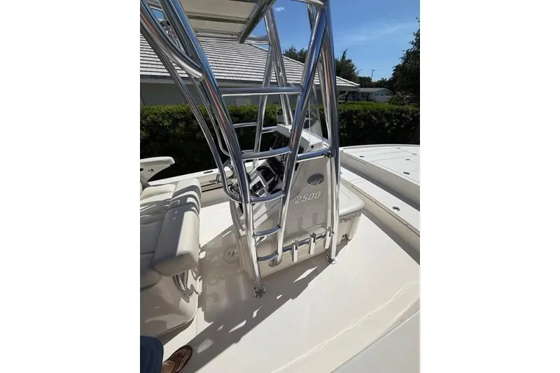 Slide: The Image of 2018 Pathfinder 2500 Hybrid boat with sleek metal framework and seating. - 8