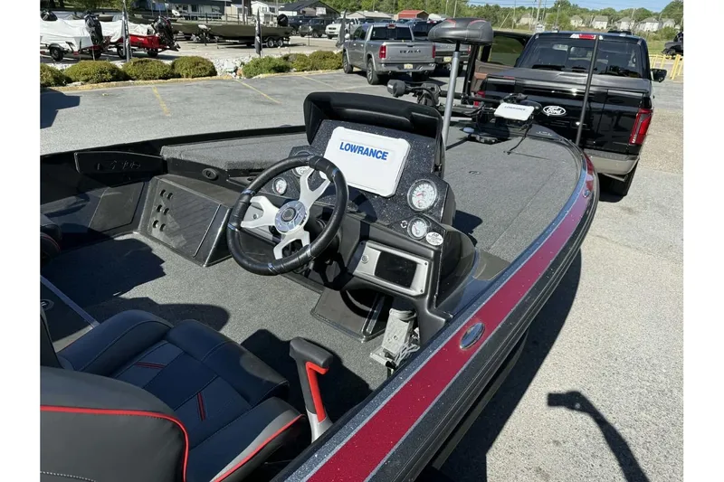 Slide: The Image of 2023 Nitro Z20 Pro boat interior with steering wheel and Lowrance navigation system. - 3