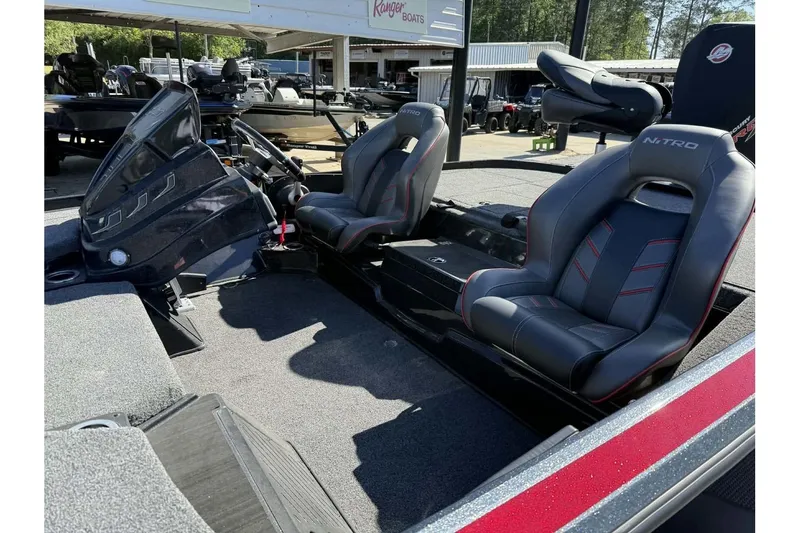 Slide: The Image of 2023 Nitro Z20 Pro boat interior with sleek seating and modern dashboard design. - 5