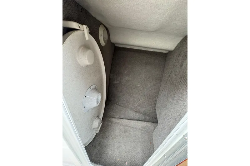 Slide: The Image of Interior storage compartment of a 2002 Chris-Craft Launch 28 boat. - 11