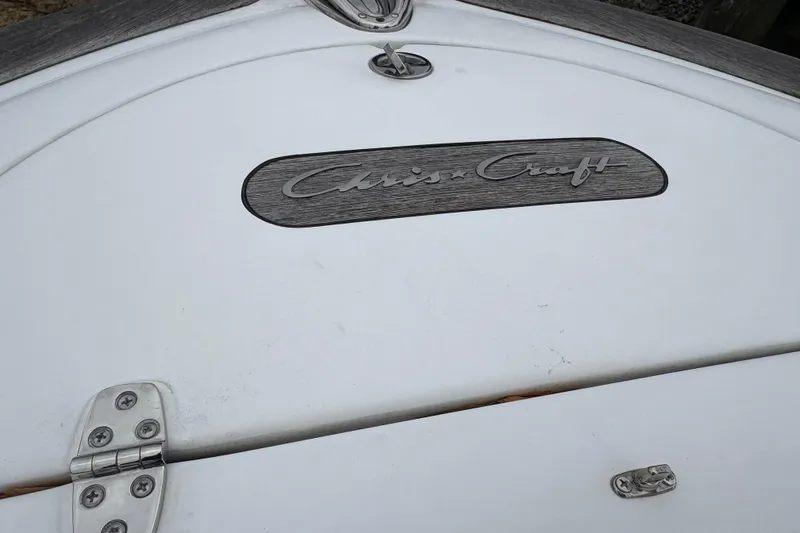 Slide: The Image of Close-up of 2002 Chris-Craft Launch 28 boat emblem and hardware. - 12