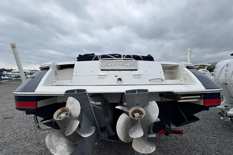 Slide: The Image of Rear view of a 2002 Chris-Craft Launch 28 boat with dual propellers. - 17