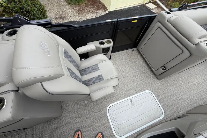 Slide: The Image of 2022 Barletta Lusso 23QCSS boat interior with luxurious seating and modern design. - 8