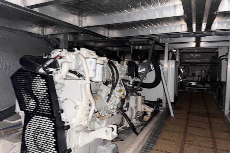 Slide: The Image of Engine room of 2006 Navigator 53 Extended Deckhouse yacht, showcasing machinery and equipment. - 16