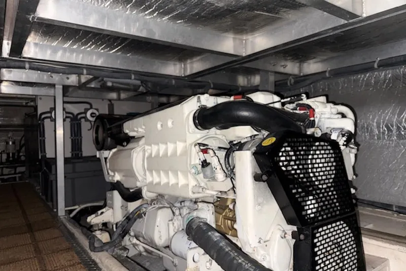Slide: The Image of Engine room of 2006 Navigator 53 Extended Deckhouse yacht, showcasing machinery and components. - 17