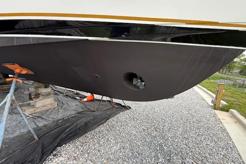 Slide: The Image of Bottom view of a 2006 Navigator 53 Extended Deckhouse yacht on dry dock. - 19