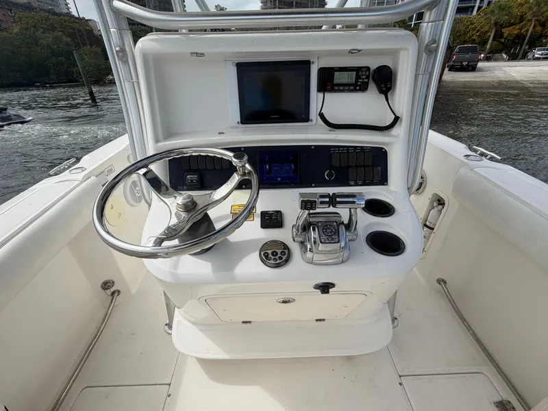 Slide: The Image of Helm console of a 2006 Boston Whaler 240 Outrage boat. - 7