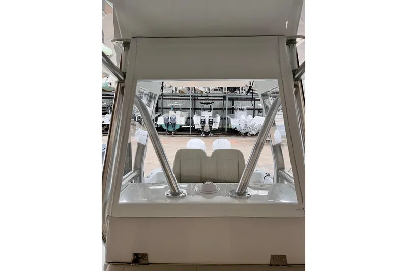 Slide: The Image of 2023 Conch 30 boat interior with seating and metal framework. - 12