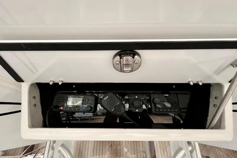 Slide: The Image of 2023 Conch 30 boat console with communication and control equipment. - 7