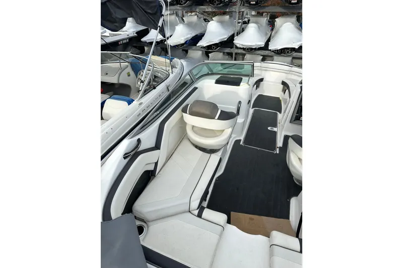 Slide: The Image of 2016 Yamaha Boats 212SS interior with sleek seating and modern design. - 24
