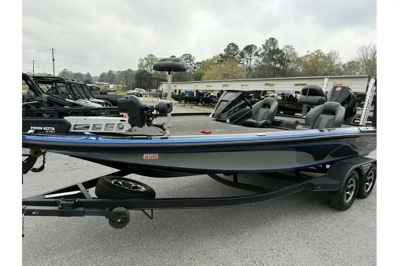 The Image of 2022 Nitro Z20 Pro fishing boat with Minn Kota Ultrex motor on trailer. - 0