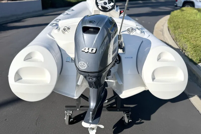 Slide: The Image of 2019 Brig Eagle 340 inflatable boat with Yamaha 40 HP outboard motor on a trailer. - 5