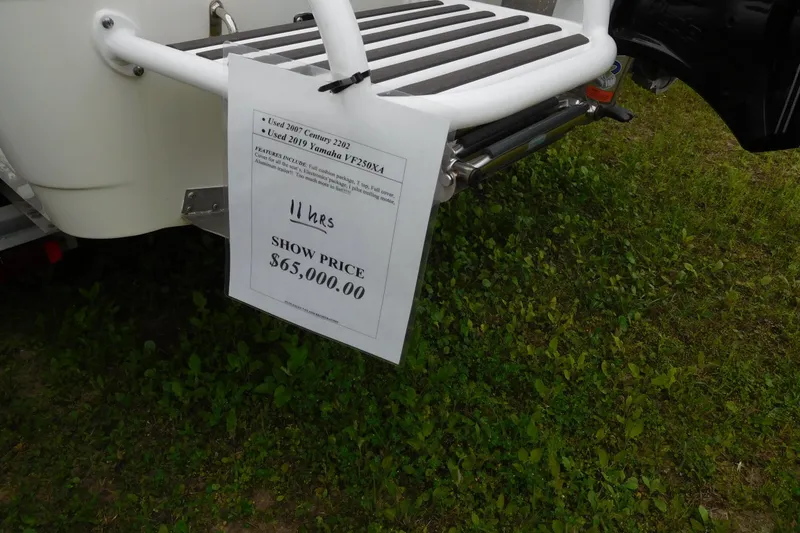 Slide: The Image of For sale sign on 2007 Century 2202 Inshore boat, priced at $65,000. - 4